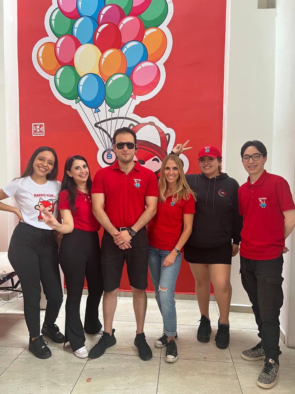 Operator in hoodie adjusting HF unit at night